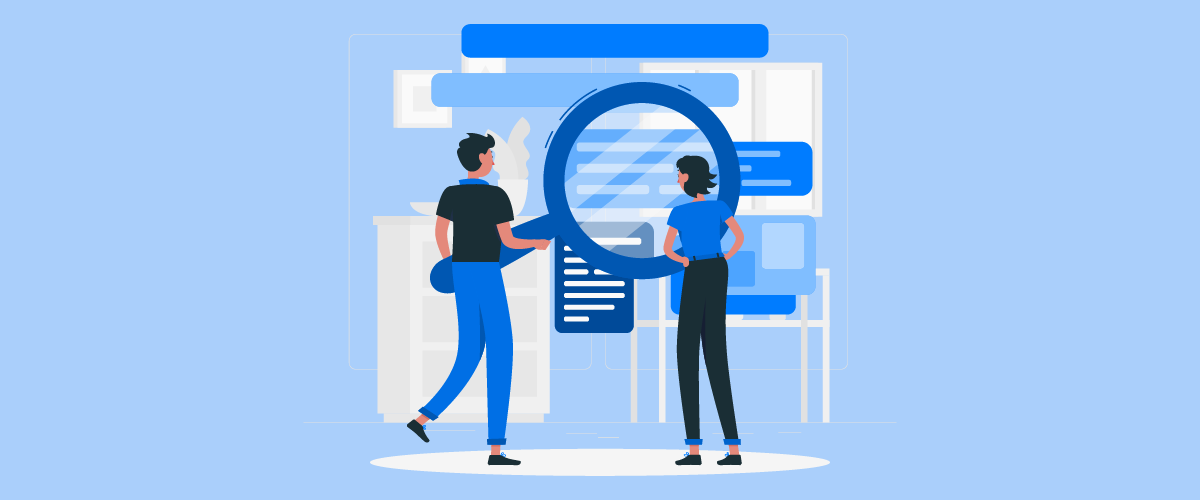 Două persoane lucrează împreună la un document. Stau în fața unui ecran mare.